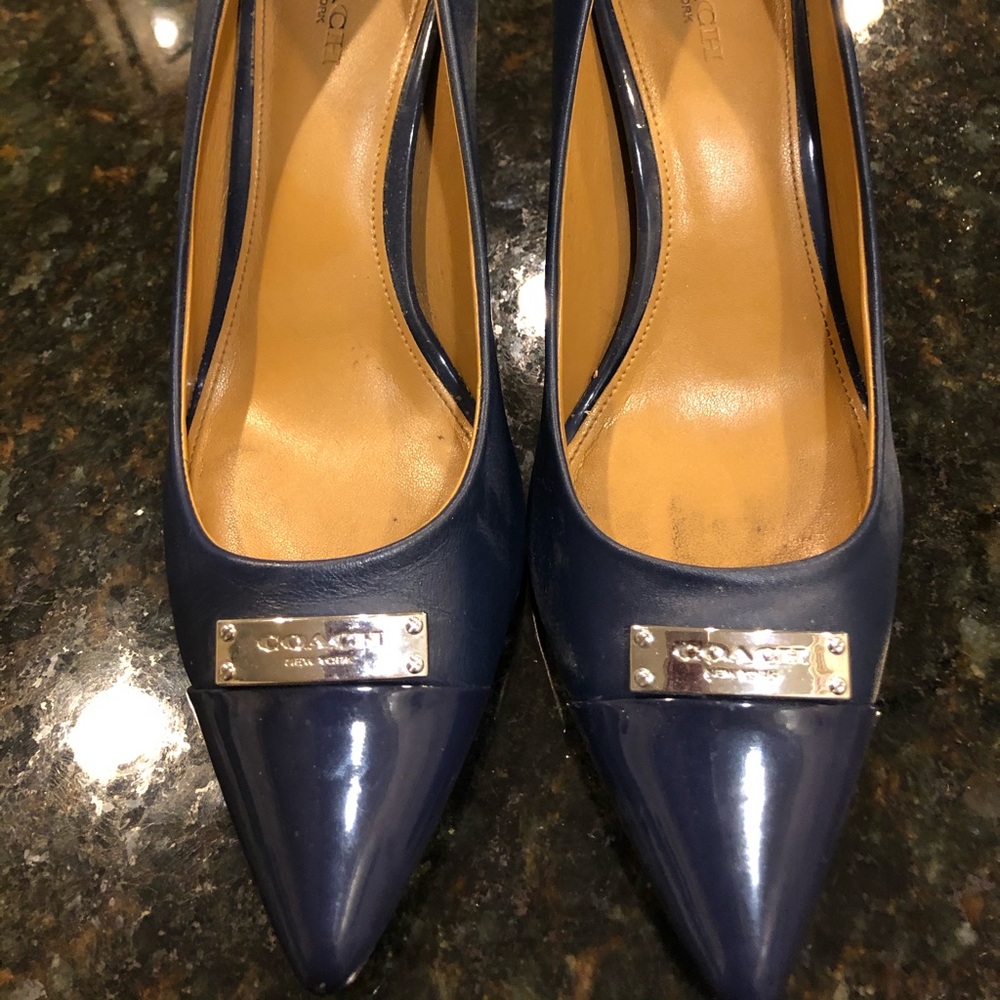 Coach  Navy blue patent and leather pumps.